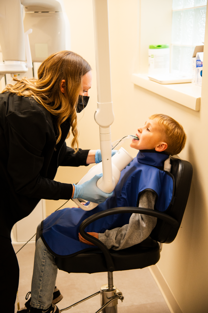 Assistant with patient