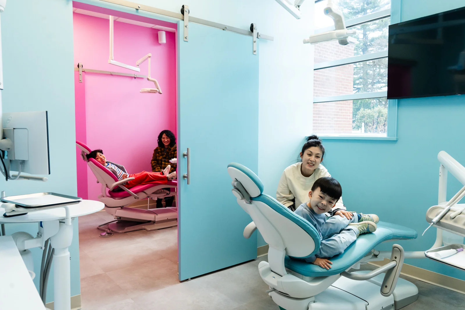 Modern pediatric dental clinic interior showcasing a clean, welcoming environment designed for children and the families.